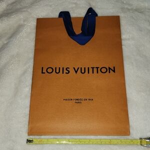 Two Louis Vuitton Orange and Blue Shopping Bags